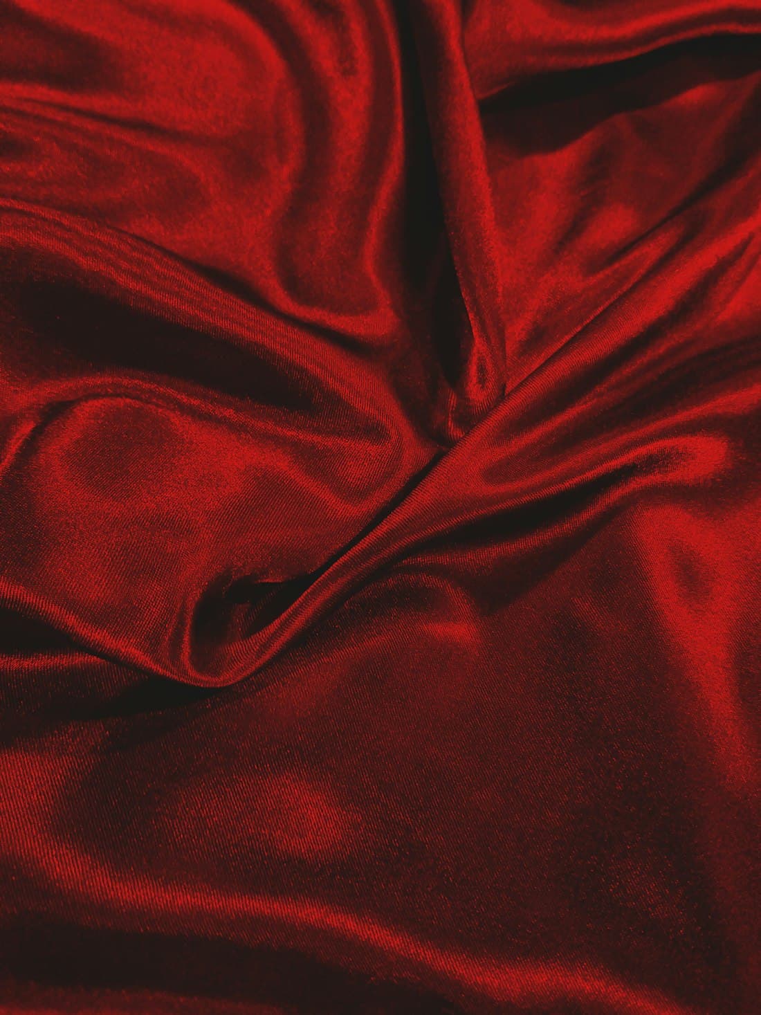 Folds of deep red silk