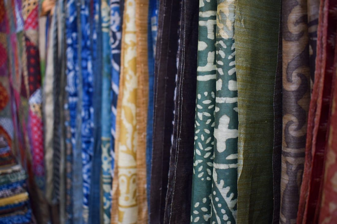 Rolls of printed and woven fabrics