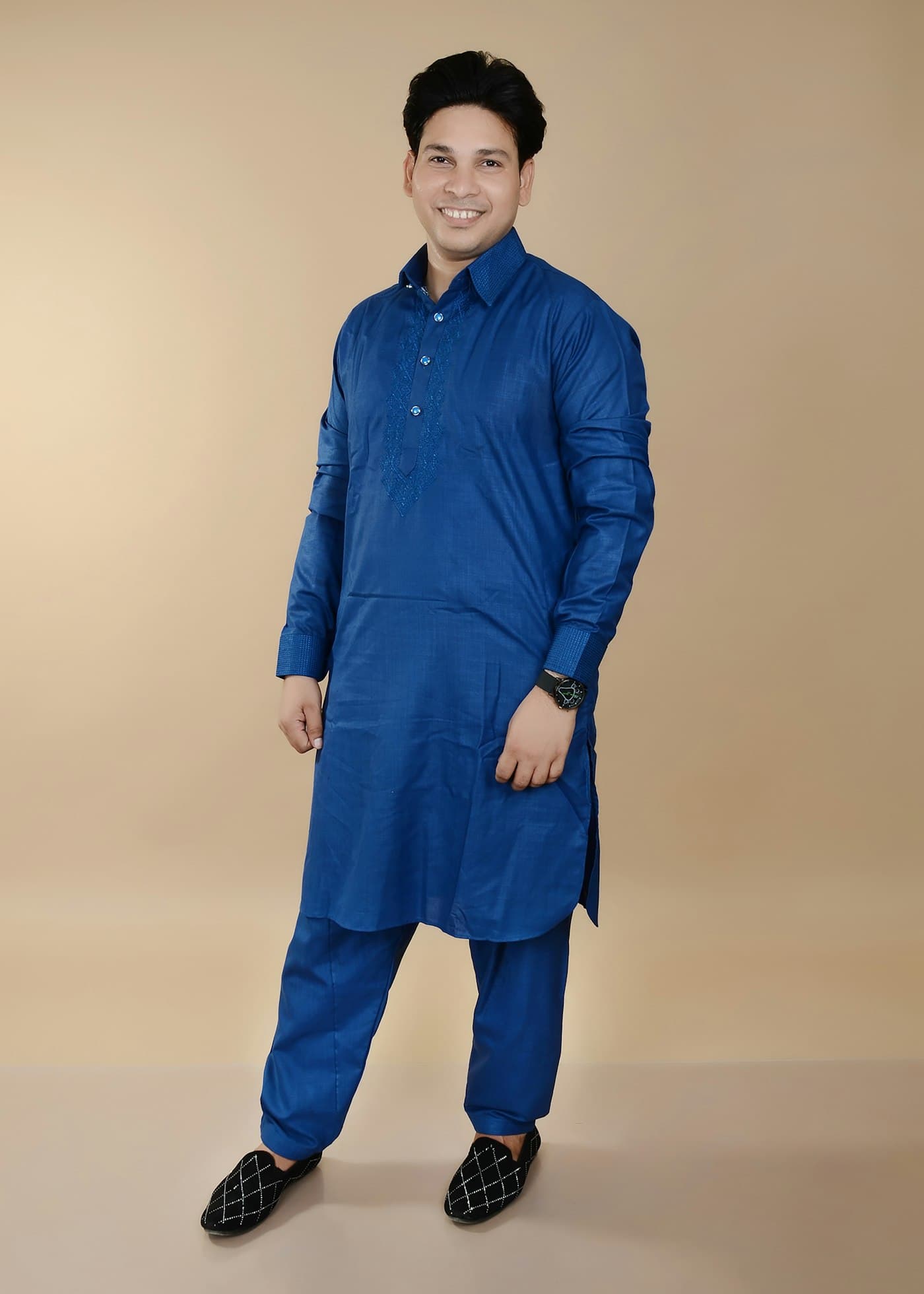 Man in an indigo panjabi set